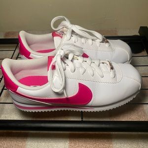 Nike Cortez sneakers.